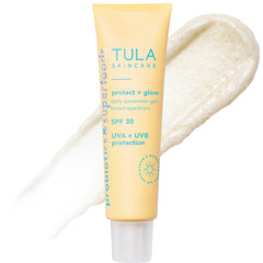 TULA Protect and Glow sunscreen bottle front showing reef-safe, non-greasy daily protection.