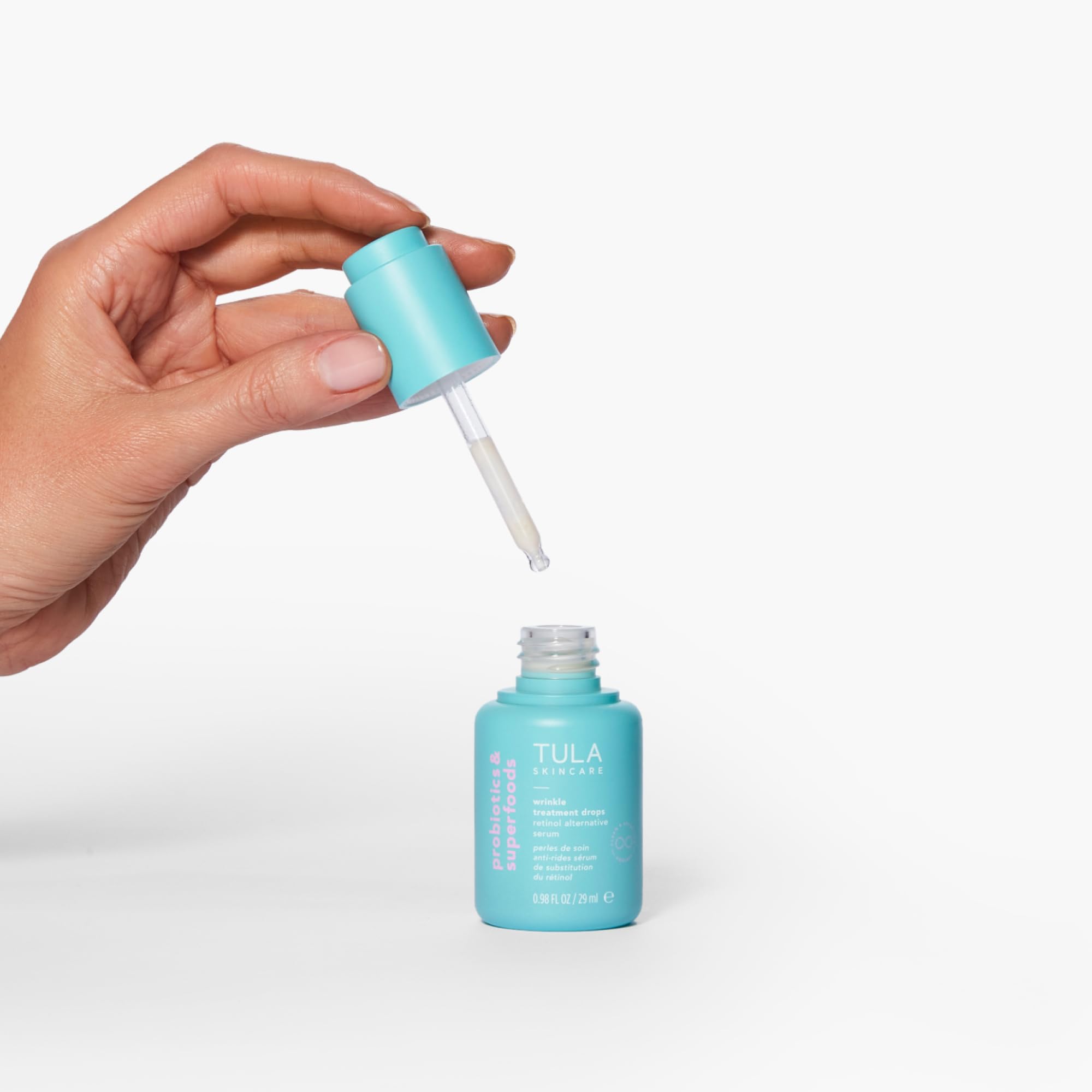 TULA drops on clean skin illustrate daily AM/PM use for refreshed complexion.
