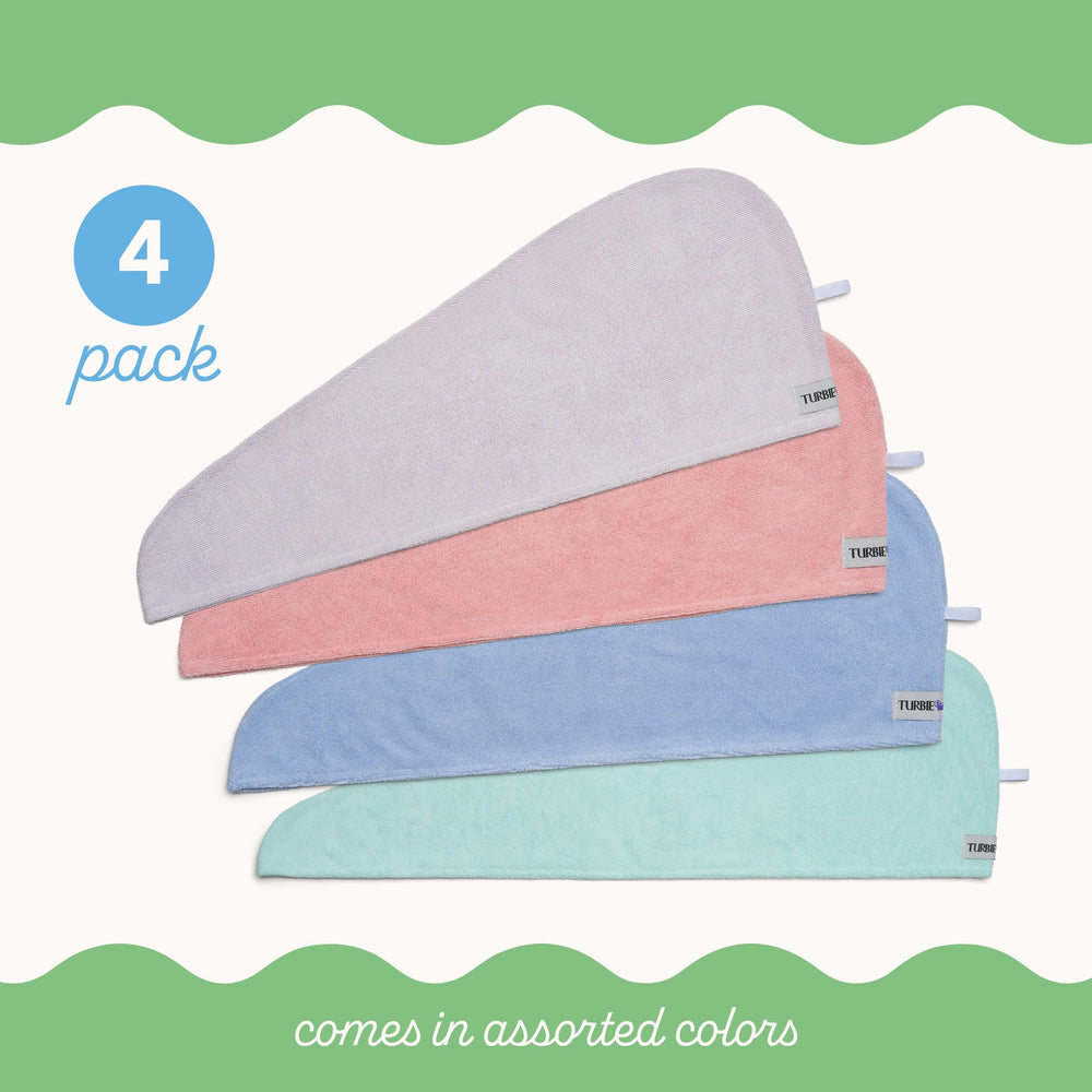 Turbie Twist blue towel with twist-loop system, secure fit for hands-free drying.