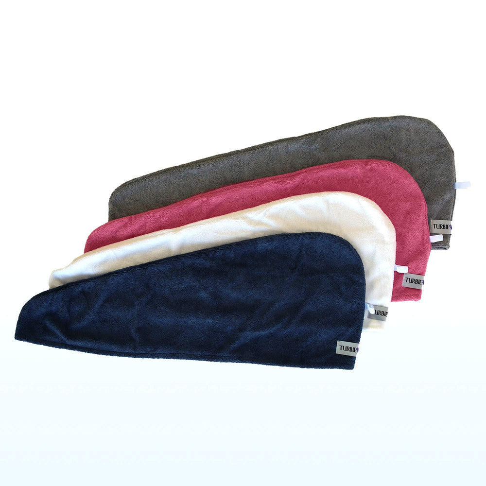Turbie Twist close-up on plush microfiber texture for gentle styling.