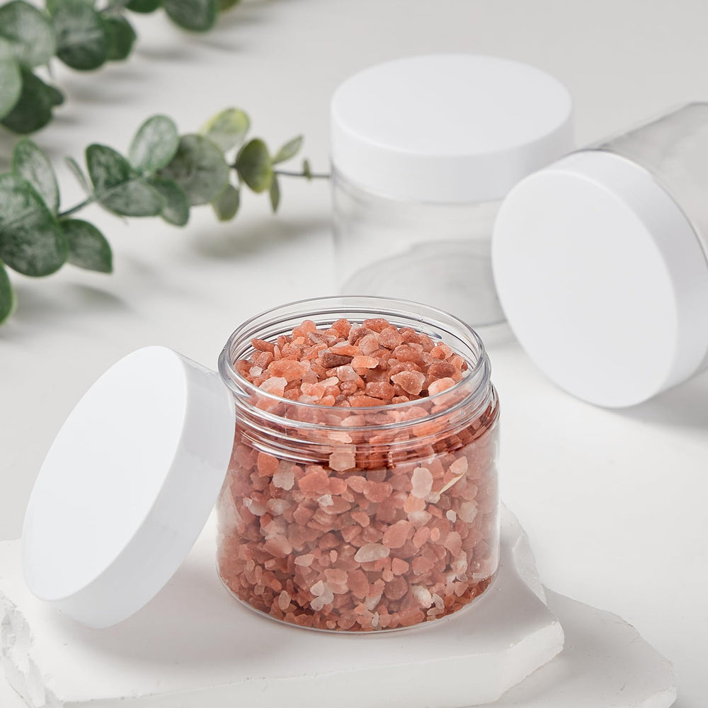 TUZAZO clear 6oz container close-up for cosmetic storage and labeling.