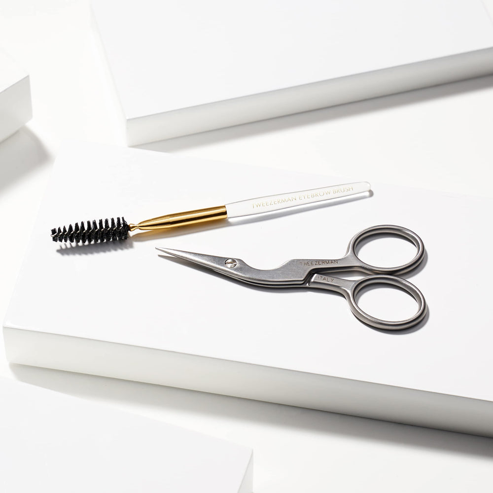 Tweezerman brow trimming process image shows hair-by-hair precision