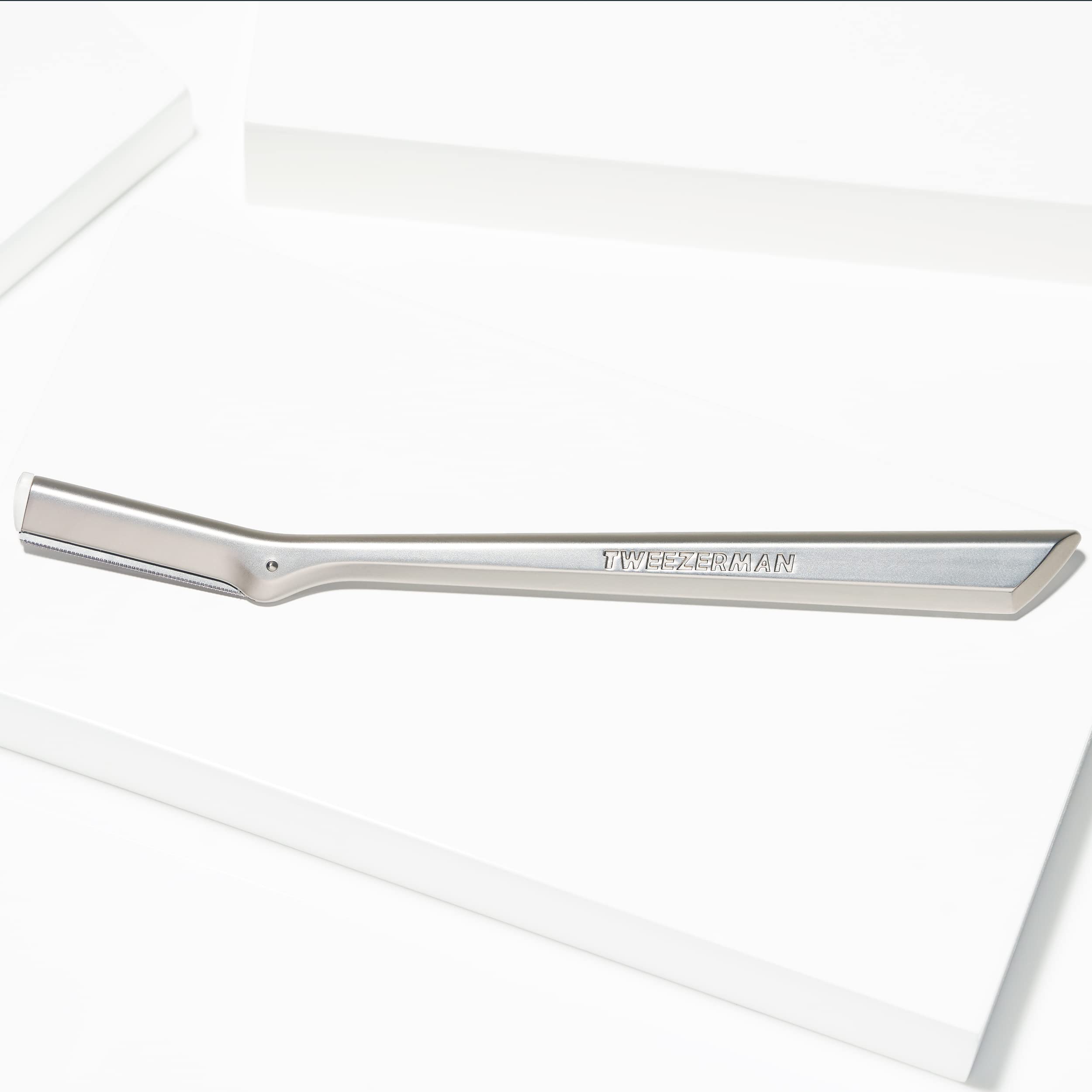 Tweezerman hygienic cleaning with alcohol demonstrating sanitation between uses