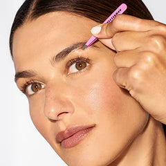 Tweezerman brow shaping with neon pink mini slant tweezer in action
