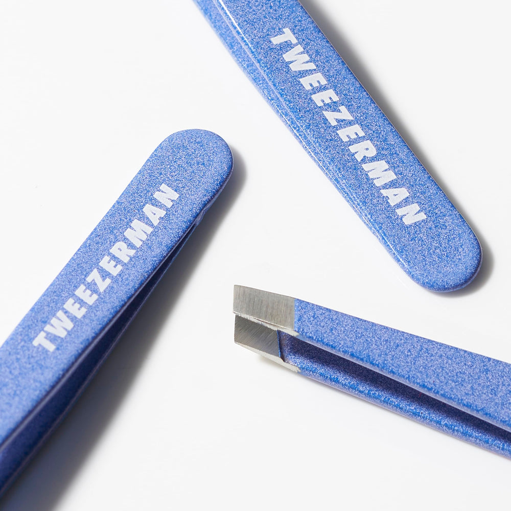Tweezerman Mini Slant Tweezer tips closeup showcasing hand-filed precision.