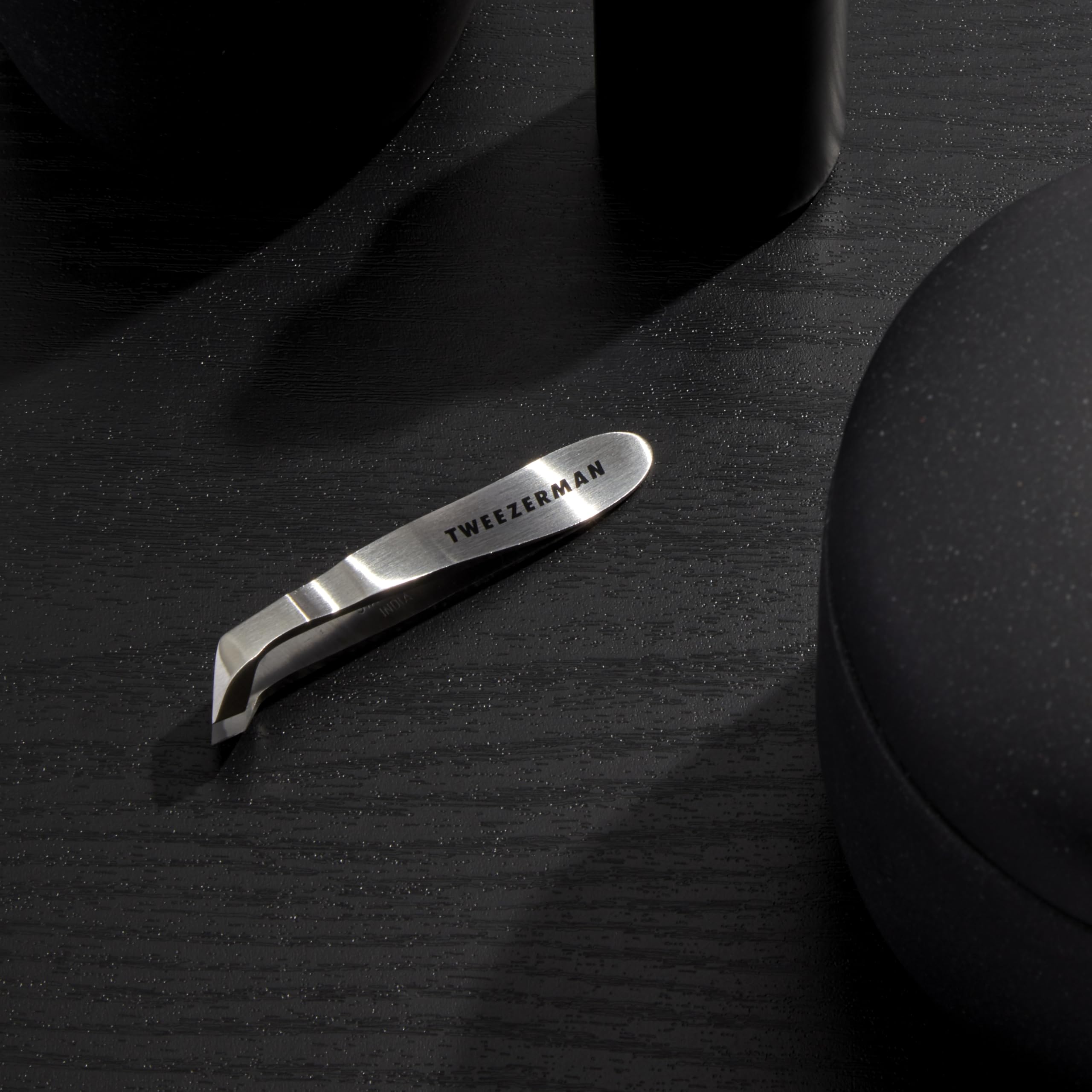 Tweezerman Mini Squeeze Cuticle Nipper trims cuticles neatly for tidy nails.