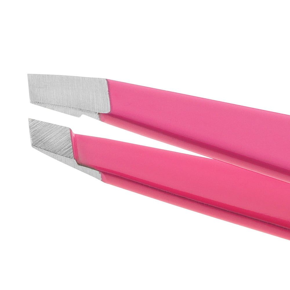 Tweezerman neon pink tweezer in use shows smooth operation for targeted hair removal.