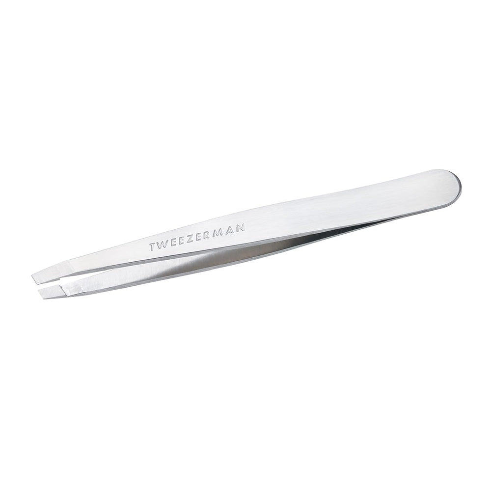 Tweezerman Platinum Slant Tweezer close-up showing precise tips for hair removal.