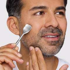 Tweezerman pore prep tool forehead-chin-end demonstrates deep-cleaning for better absorption.