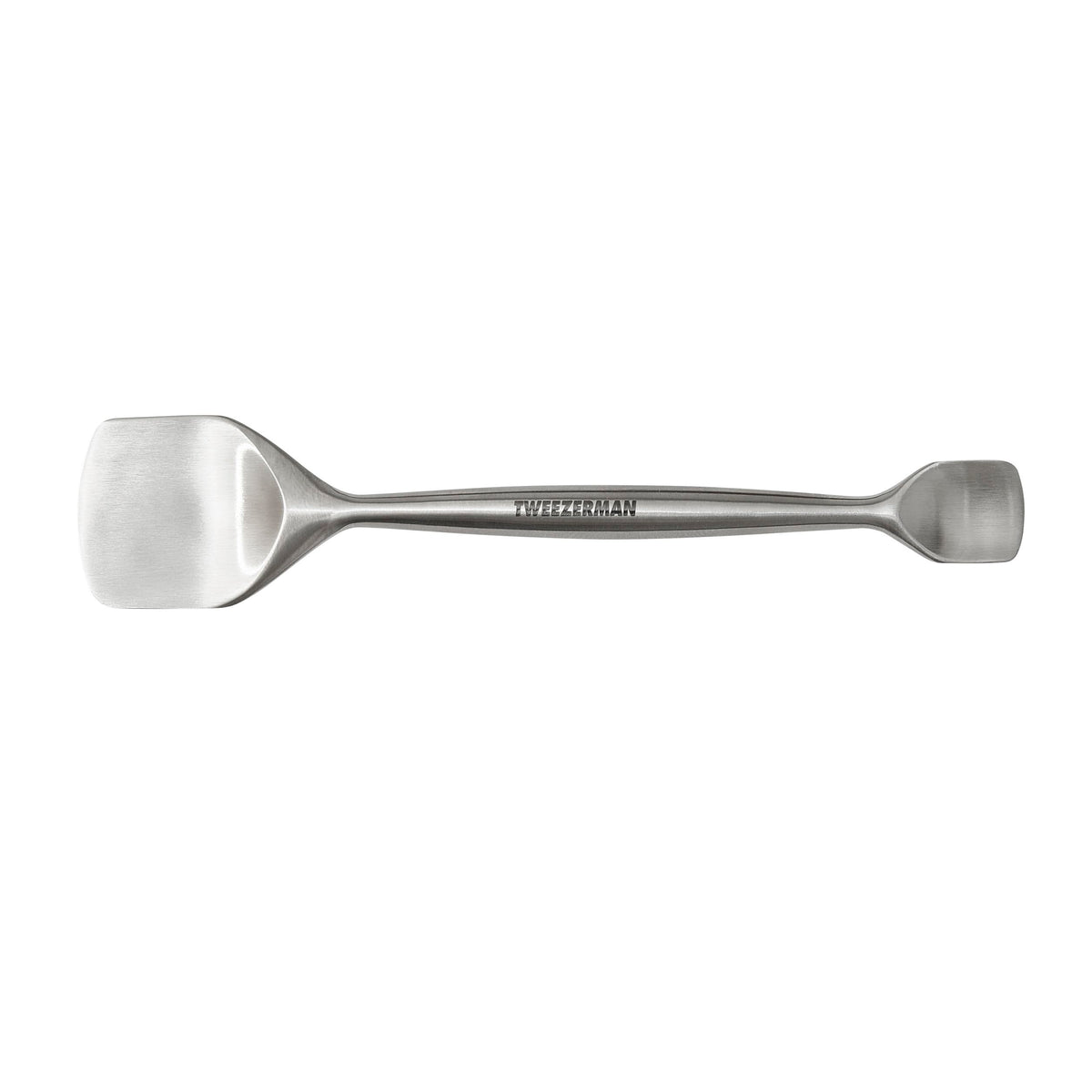 Tweezerman pore prep tool nose-end closeup shows precise tip for gentle unclogging.