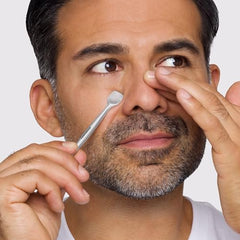 Tweezerman pore prep tool small-end closeup highlights nose-area pore clearing.