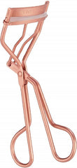 Tweezerman Rose Gold Eyelash Curler close-up highlighting ergonomic design for precise curling.