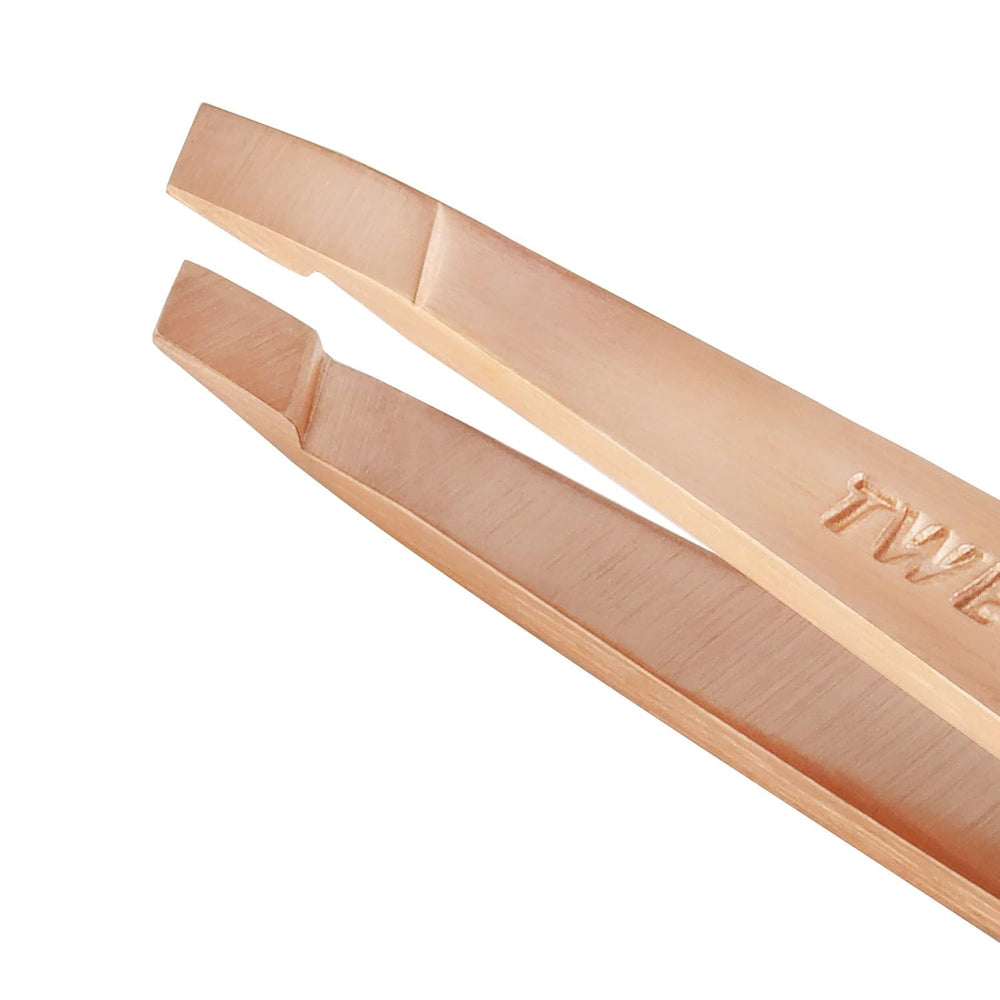 Tweezerman rose gold mini slant tweezer travel case keeps grooming on the go