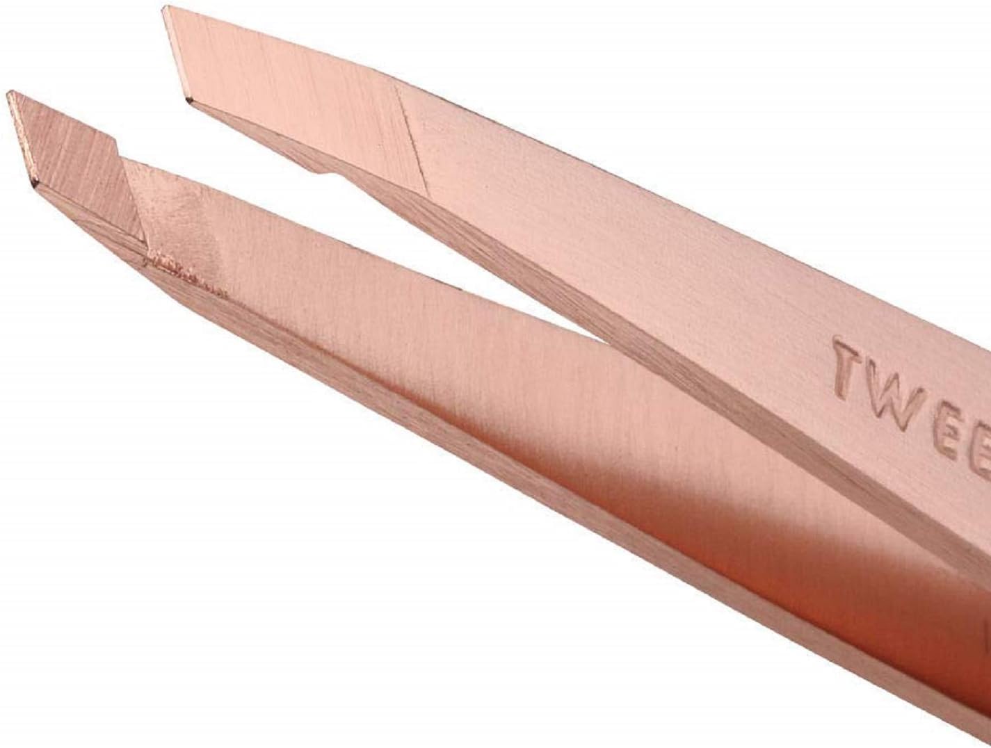 Tweezerman rose-gold slant tweezer held in hands demonstrating precise hair removal.