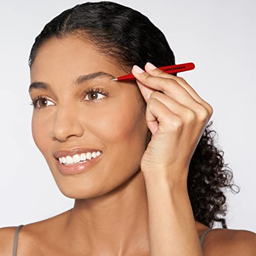 Tweezerman signature red point tweezer displayed as professional grooming tool