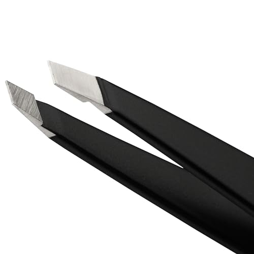 Tweezerman stainless-steel slant tweezer demonstrates hair-grab precision against the brow line.