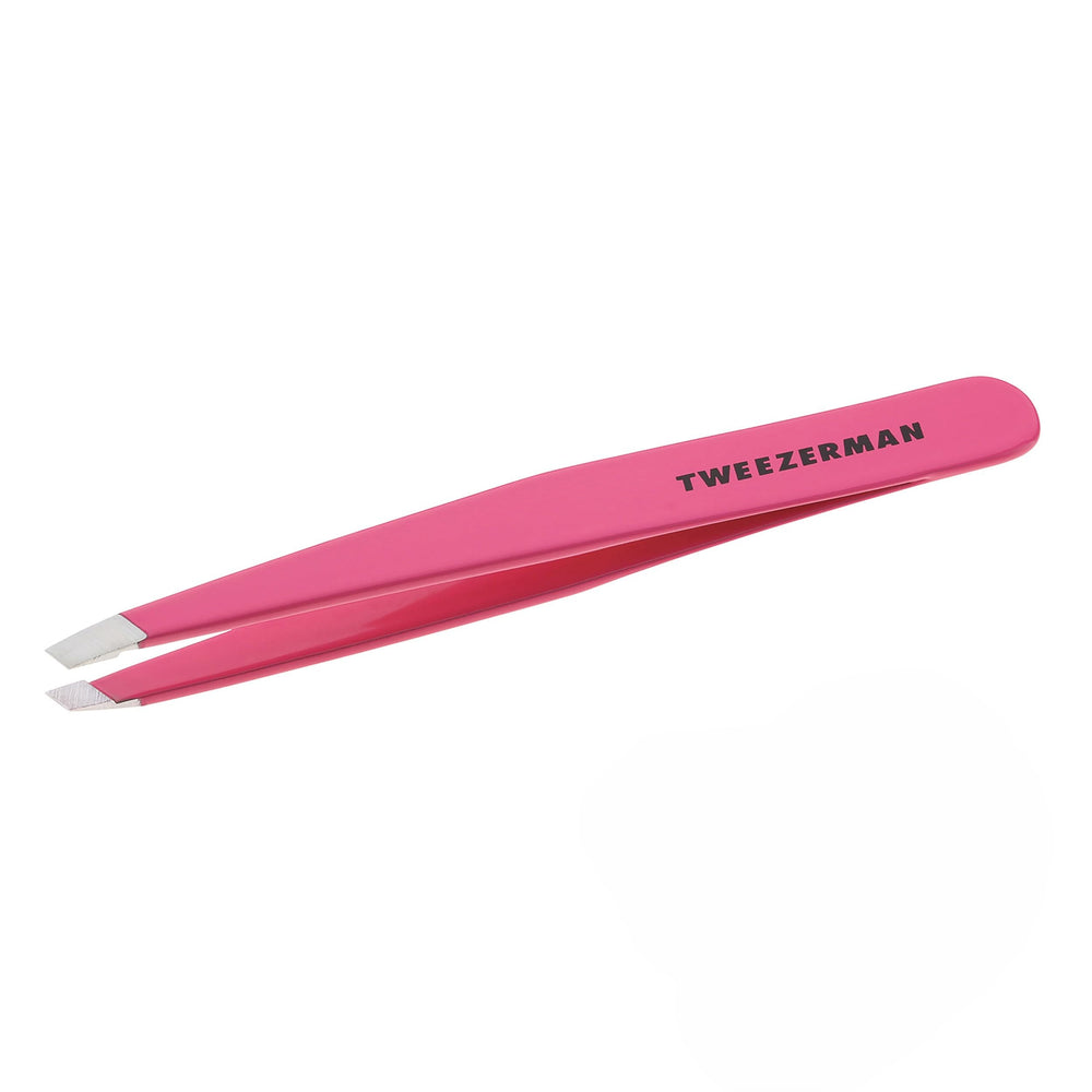Tweezerman stainless-steel slant tweezer neon pink closeup shows precise aligned tips for brow shaping.