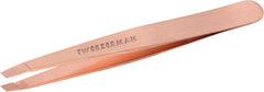 Tweezerman rose-gold slant tweezer close-up showing precision for brow shaping.