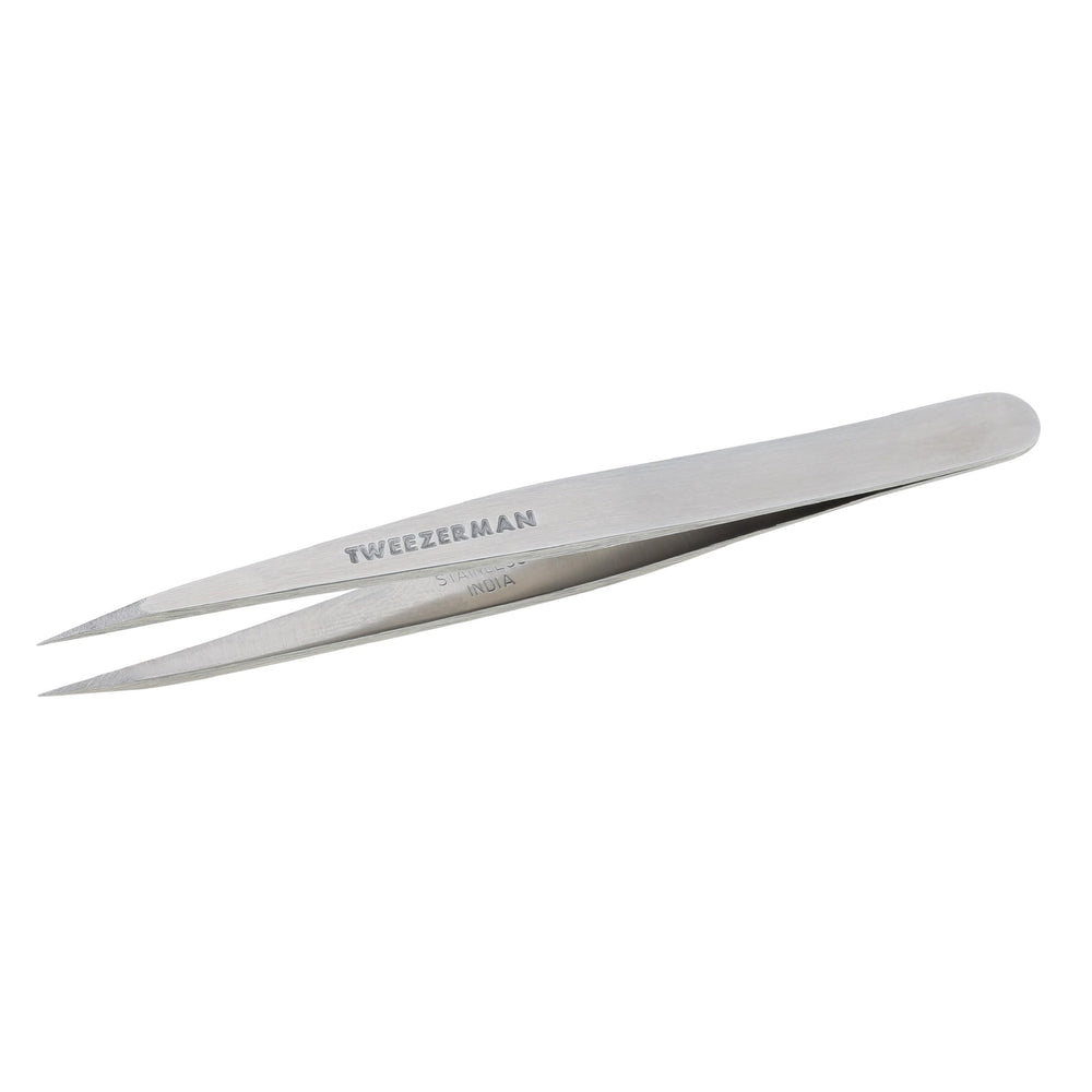 Tweezerman steel point tweezer silver closeup shows precise tips for fine hair removal