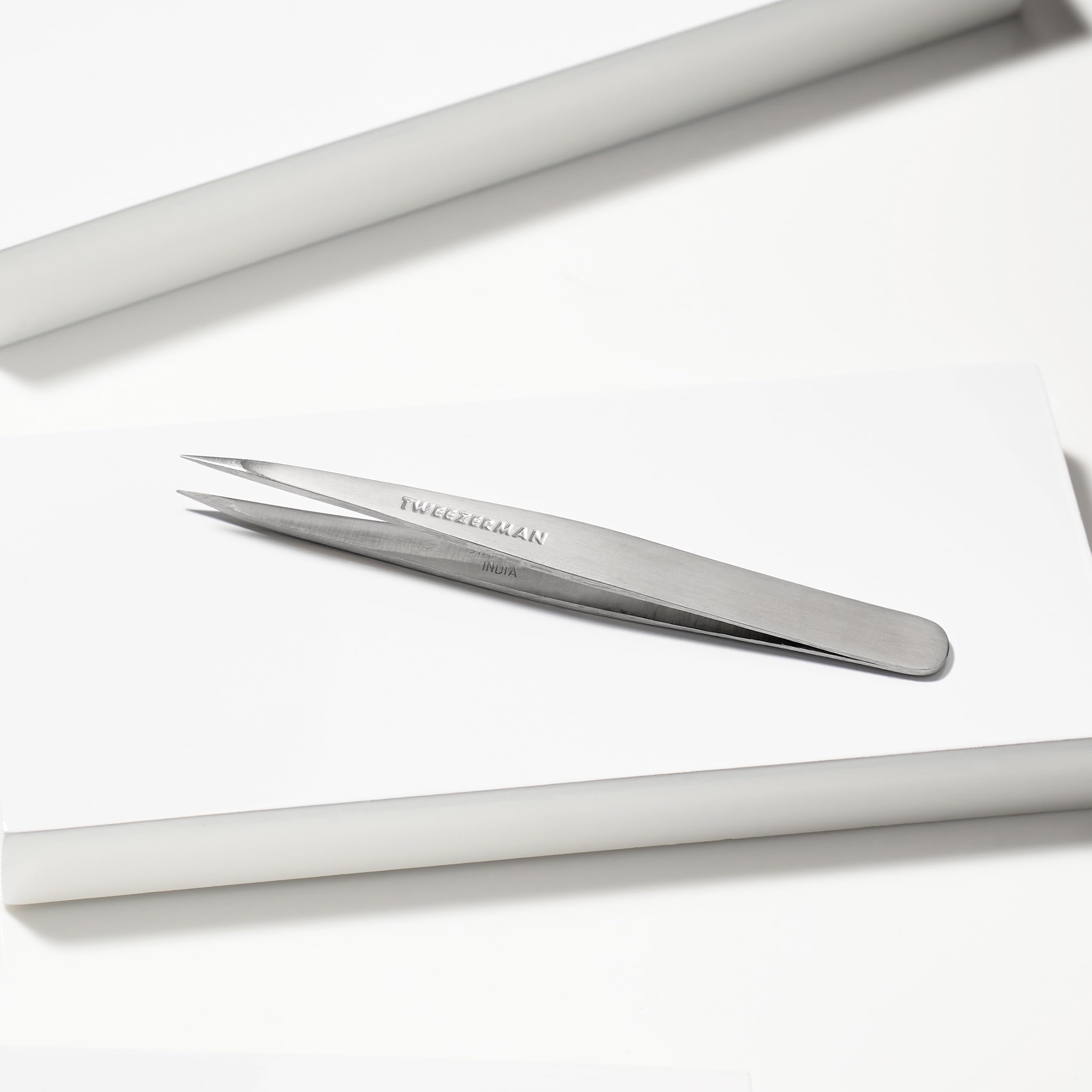 Tweezerman steel point tweezer silver angled 25-degree technique for precise grip