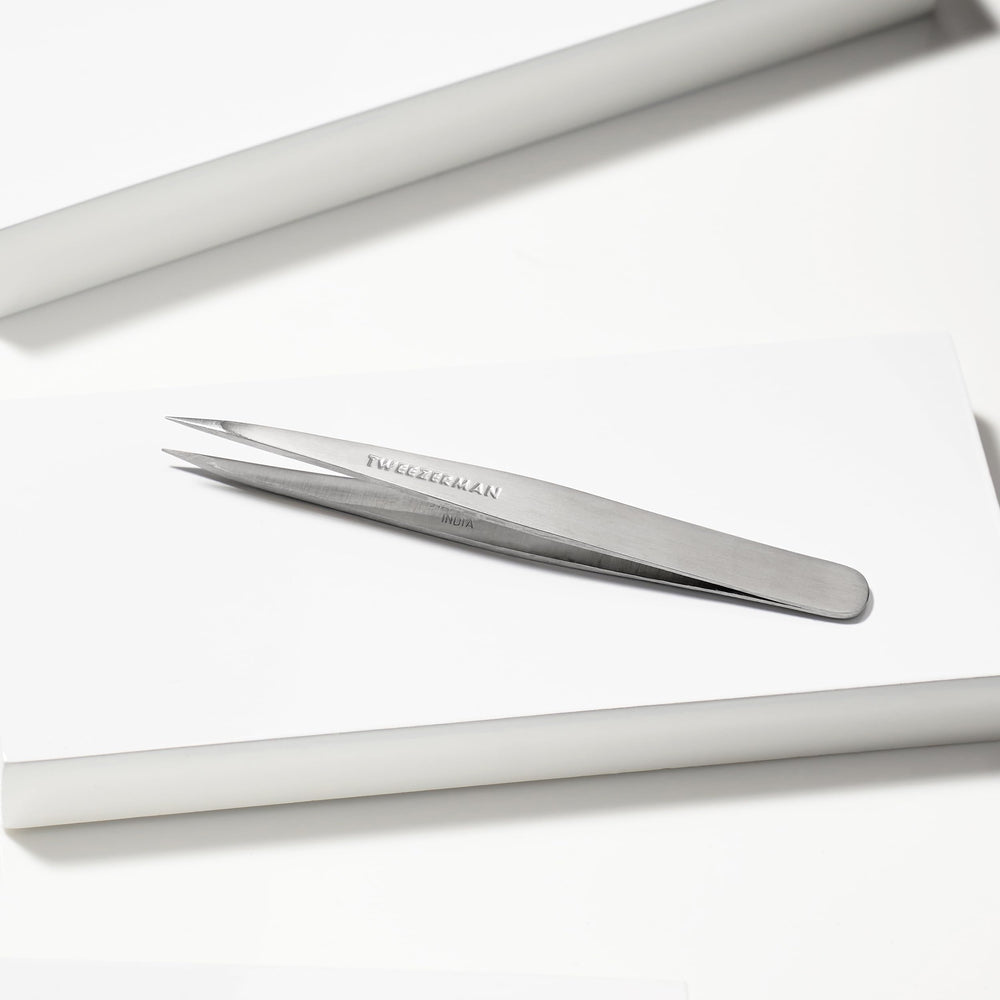 Tweezerman steel point tweezer silver angled 25-degree technique for precise grip