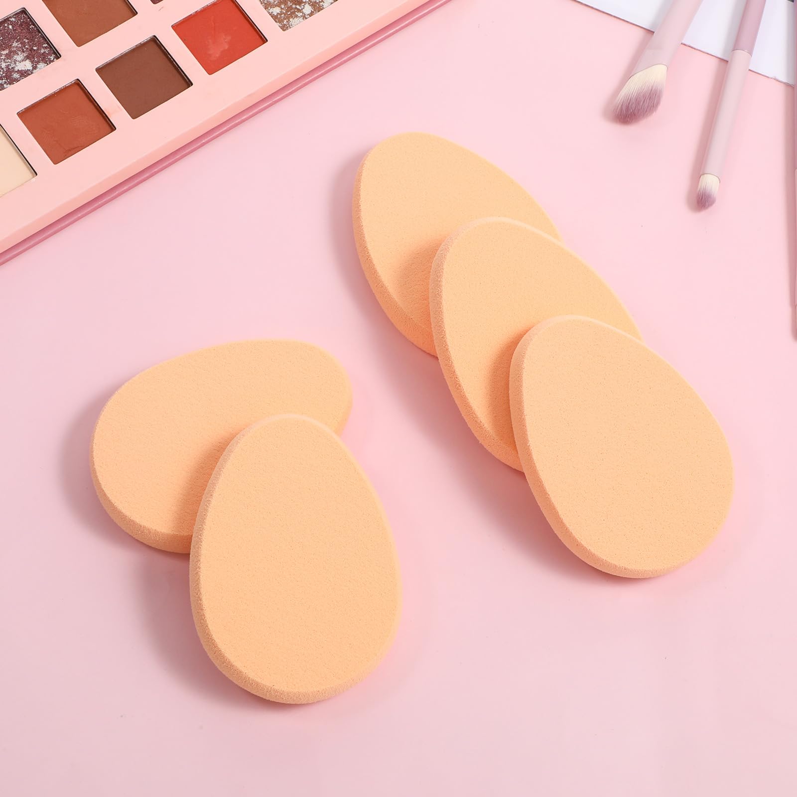 Tweruna waterdrop sponge with ergonomic grip reaches hard-to-reach areas.