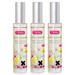 TYMO heat protectant bottle in use, guarding hair against heat up to 450°F.