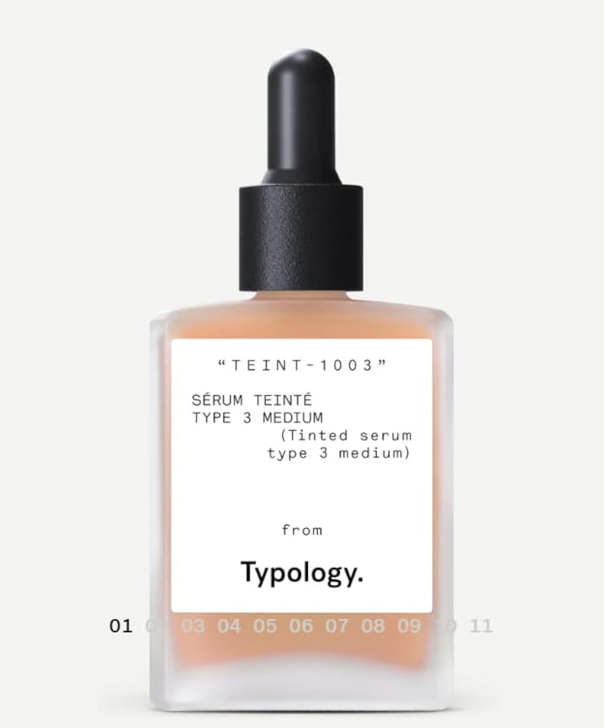 Typology tinted serum bottle close-up promoting radiant skin with vegan formula.