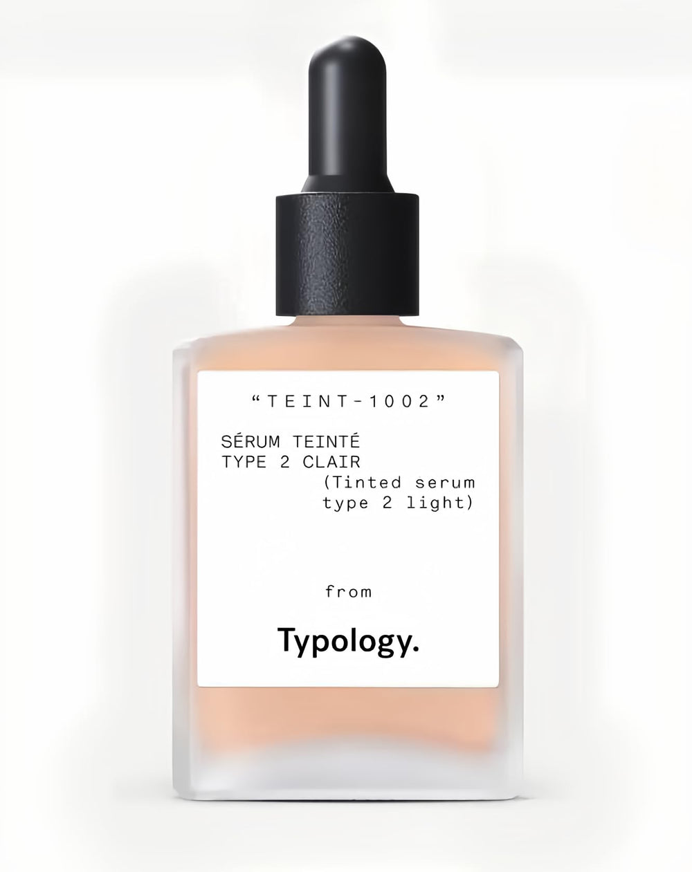 Typology Tinted Serum Type 2 Light bottle close-up highlights vitamin C and hydration.