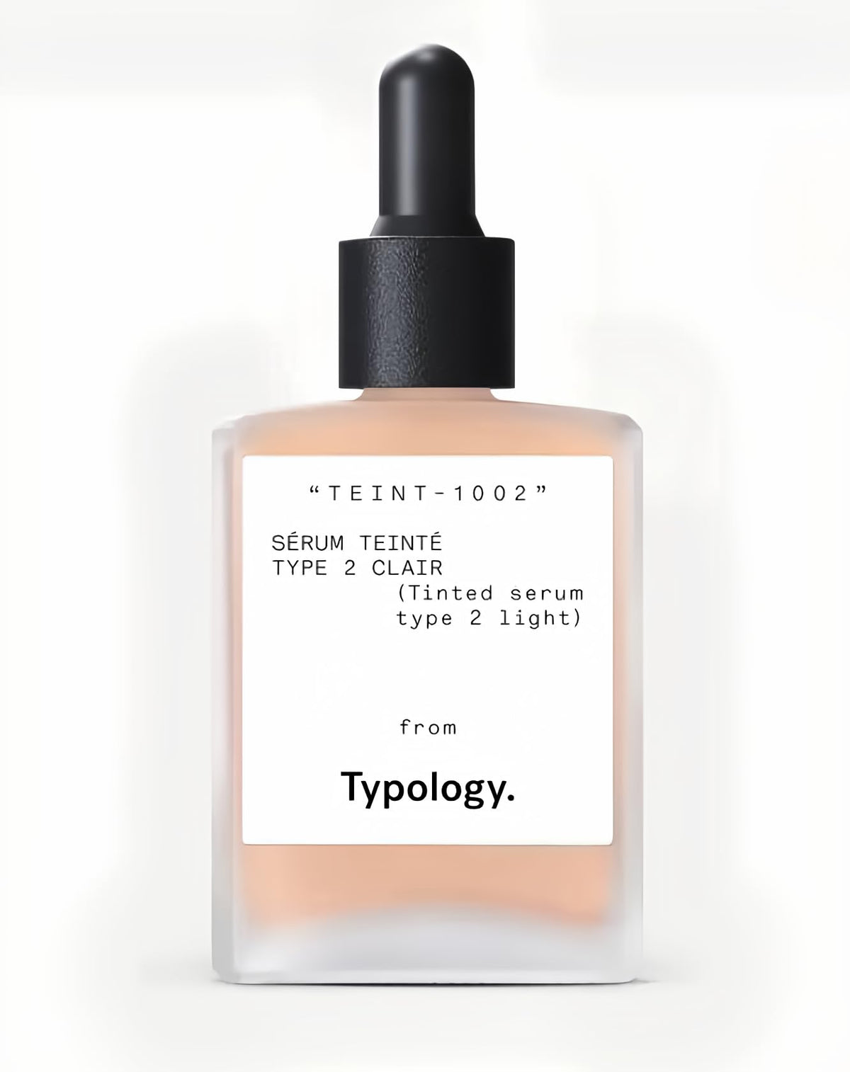 Typology Tinted Serum Type 2 Light bottle close-up highlights vitamin C and hydration.