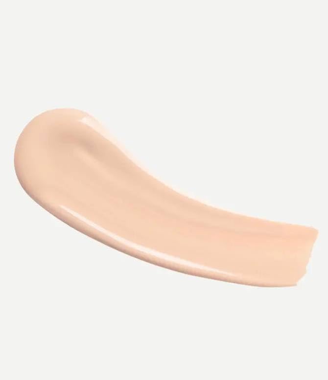 Typology Tinted Serum Type 2 Light brush application shows light coverage and skin benefits.