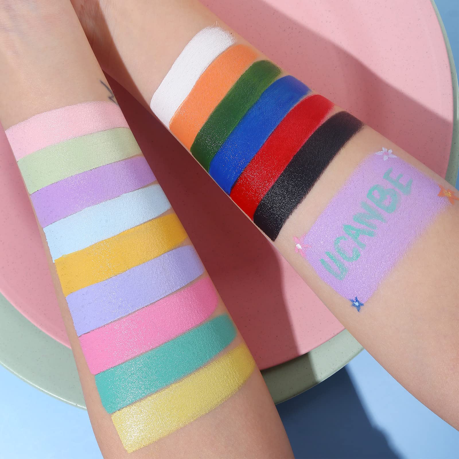 UCANBE Face Body Paint Oil application close-up shows smooth base and crisp line work.