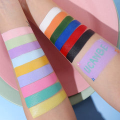 UCANBE Face Body Paint Oil application close-up shows smooth base and crisp line work.