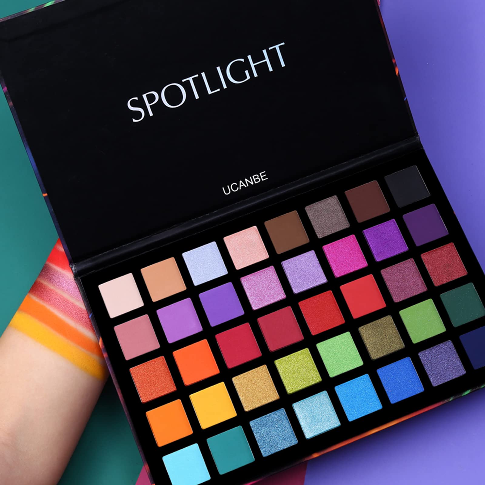 UCANBE Spotlight swatches showing vibrant mattes and shimmers.