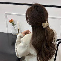 UCCASA cat ear hair clip side view highlights durable spring and inner teeth