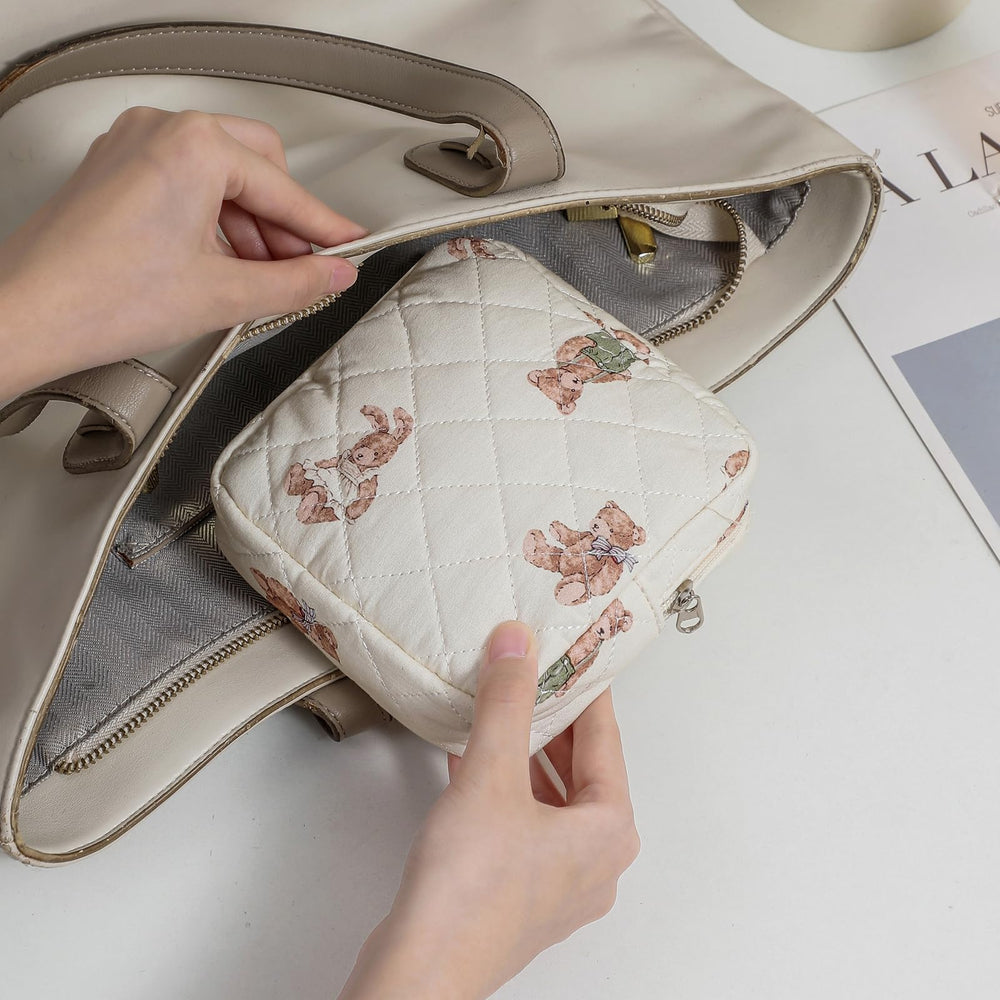 uekeboag cotton cosmetic bag inner pocket keeps lipstick and cards neatly separated.