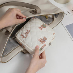 uekeboag cotton cosmetic bag inner pocket keeps lipstick and cards neatly separated.