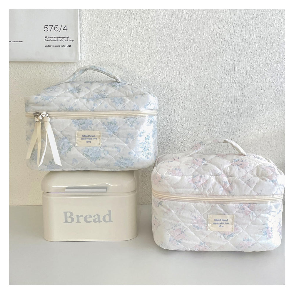 uekeboag bag includes organized interior compartments for cosmetics