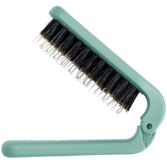 Uffy MiniPop travel brush folded for ultra-compact on-the-go styling
