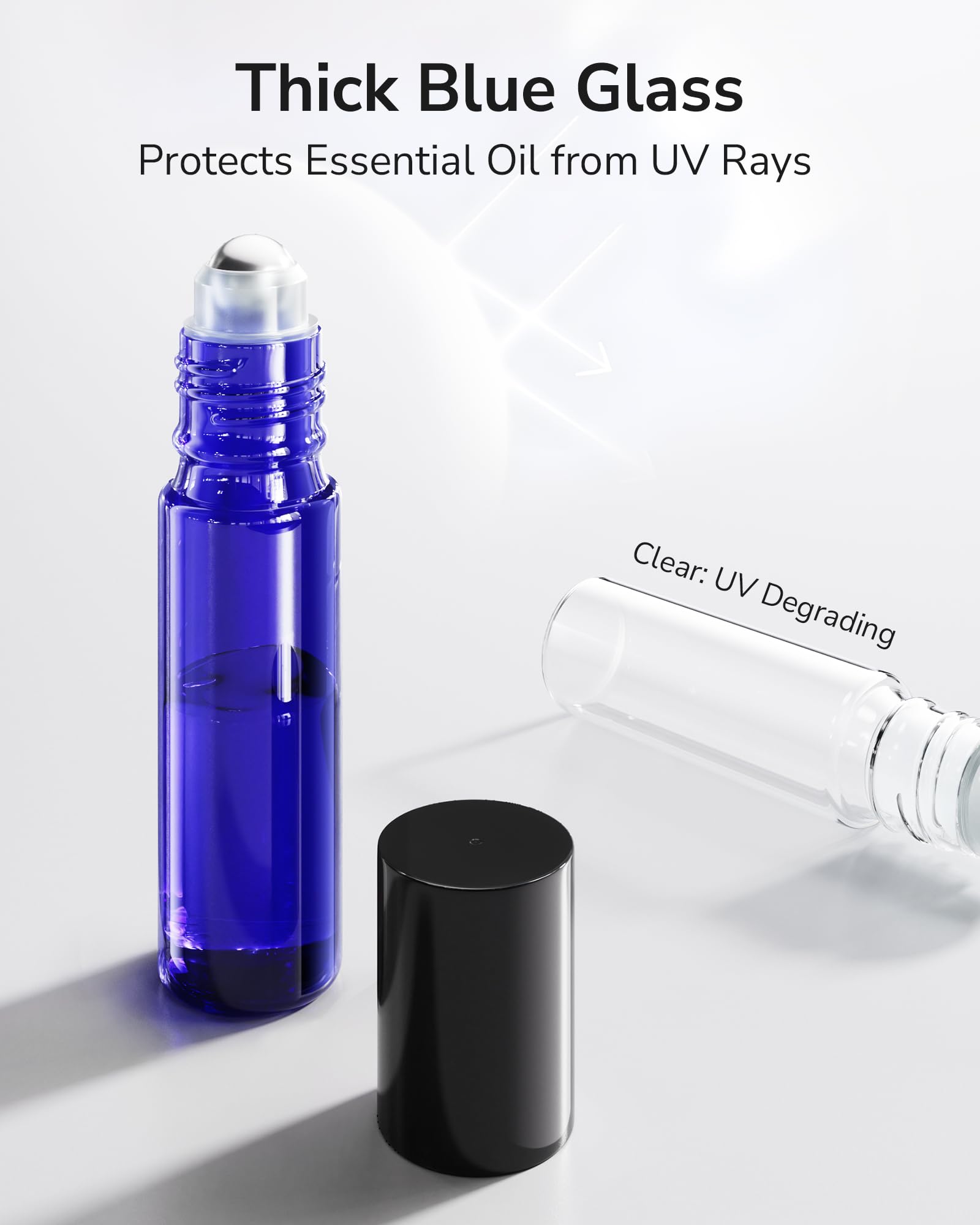 ULG roller bottle cobalt blue glass close-up with stainless steel roller ball.