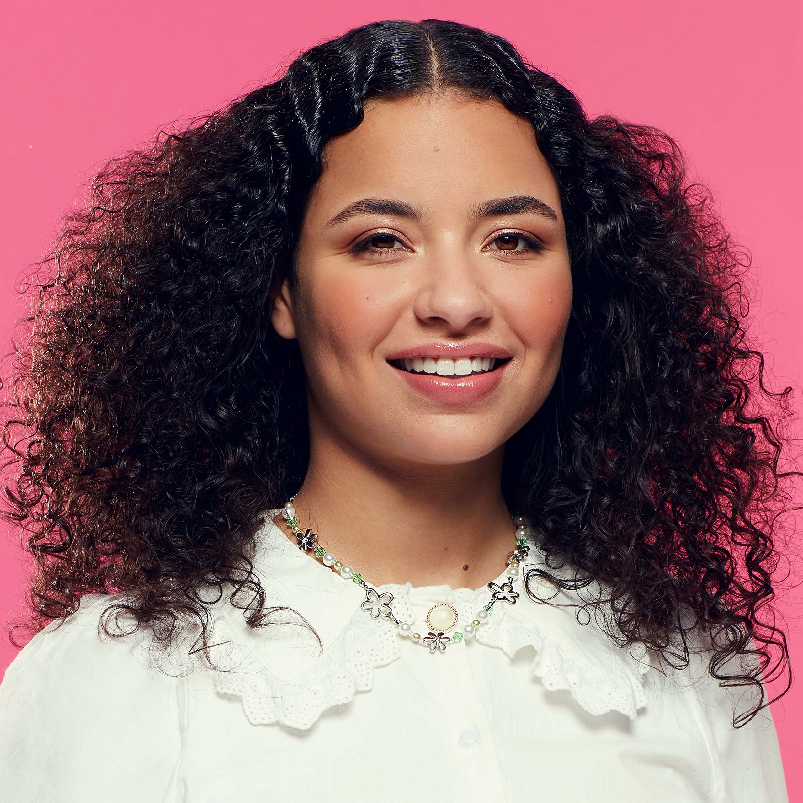 Umberto Giannini Curl Jelly applied for smooth curl definition.