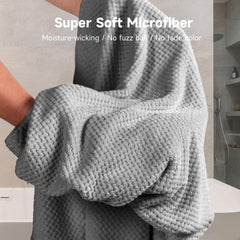 Umisleep extra-large towel elastic band keeps towel secure during use.