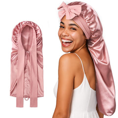 Umisleep Silk Bonnet pink closeup shows luxurious 22 momme silk for gentle hair care.