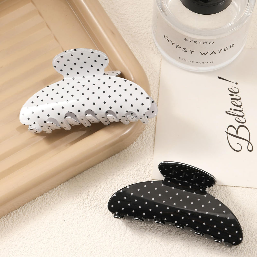Unbednigt black and white polka dot clip adds retro charm and hold