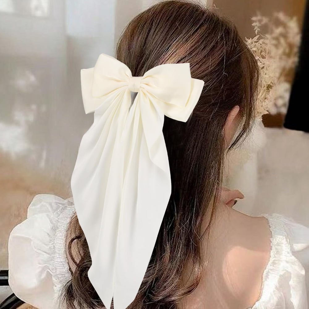 Unbednigt large green hair bow clip styled for festive occasions.