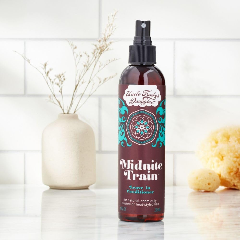 Uncle Funky's Daughter Midnite Train leave-in application demonstrates easy detangling and softer hair