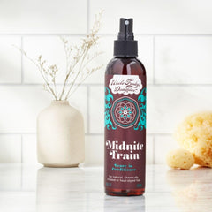 Uncle Funky's Daughter Midnite Train leave-in application demonstrates easy detangling and softer hair