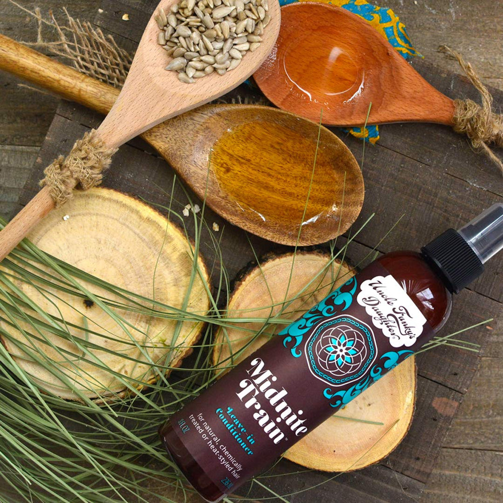 Uncle Funky's Daughter Midnite Train leave-in shelf display emphasizes convenient at-home care