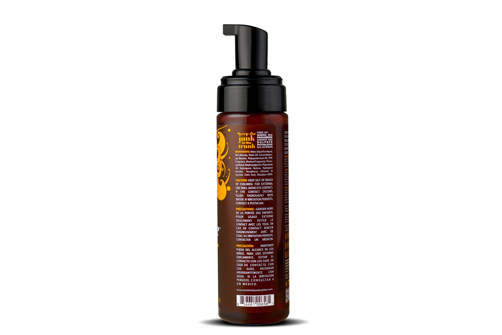 Uncle Funky's Daughter Soul Bounce mousse on hair adds shine and definition.