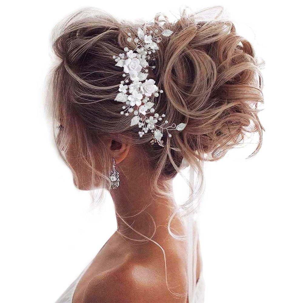 Unicra flower bride hair vine silver closeup highlights crystal detail for bridal shimmer.